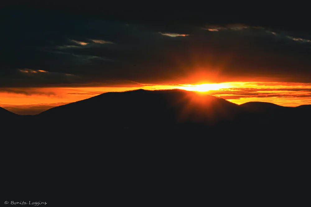 sunset over a mountain in West Jefferson